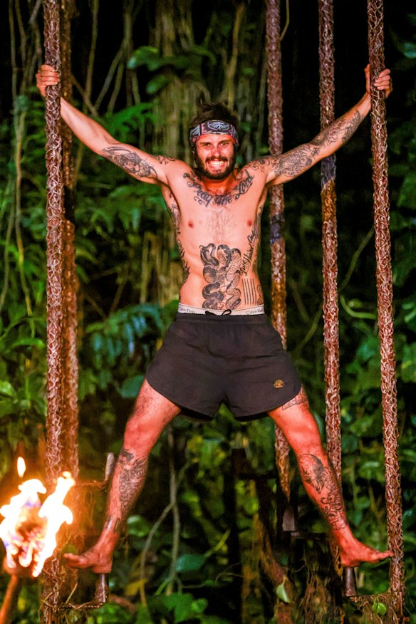 Caleb Beeby during the final immunity challenge, where he stood on small wooden pegs for more than four hours. 
