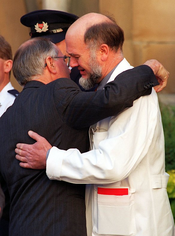 John Howard hugs Dr Bryan Walpole in the days after the Port Arthur massacre.
