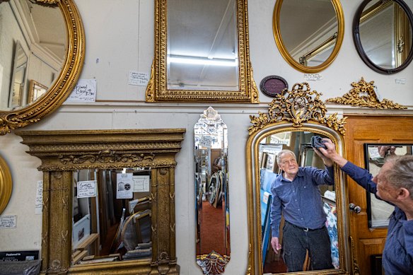 Denis Kosnar in his quaint and curious Kosnar’s Picture Framing and Mirrors Shop.