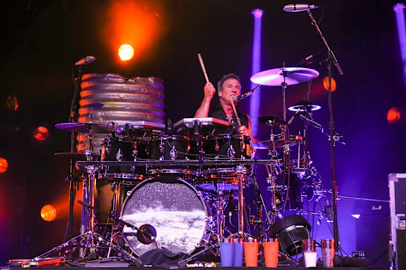 Hirst performing with Midnight Oil in 2017.