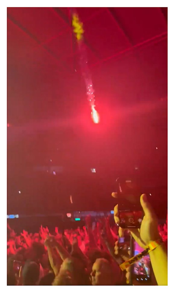 A lit flare at Friday night’s Oasis concert at Melbourne’s Marvel Stadium. 