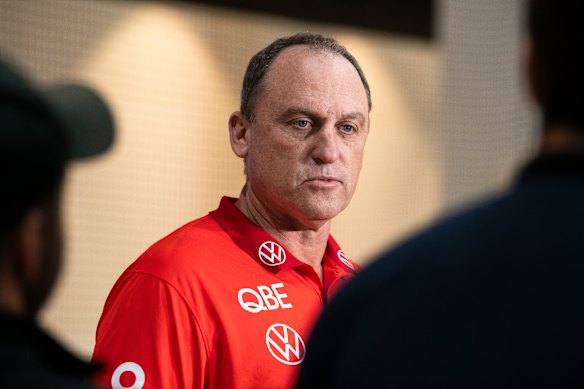 Top pick: Former Carlton ace Brendan Fevola says the Blues need to target John Longmire to be their new senior coach.