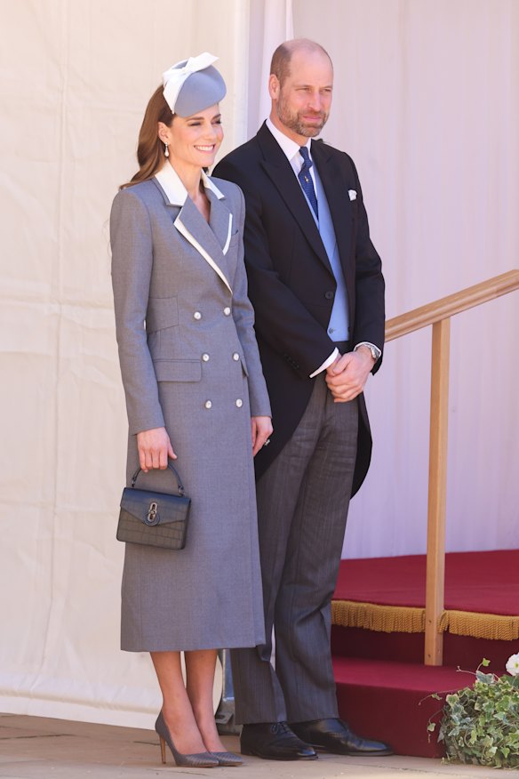 Princess Catherine in a Tolu Coker coat with Prince William, greeting the Nigerian party at Windsor Castle.