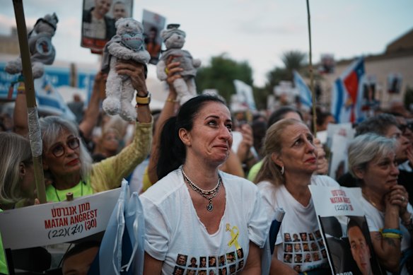People gather at a plaza known as Hostages Square.