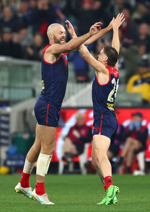Max Gawn of the Demons is congratulated by Trent Rivers after kicking a goal.