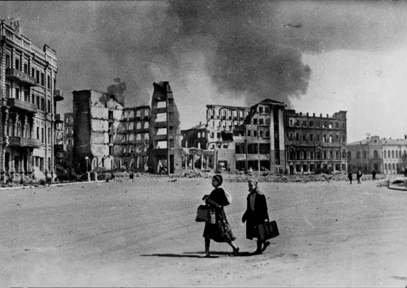 Civilians return to the ruins of Stalingrad.