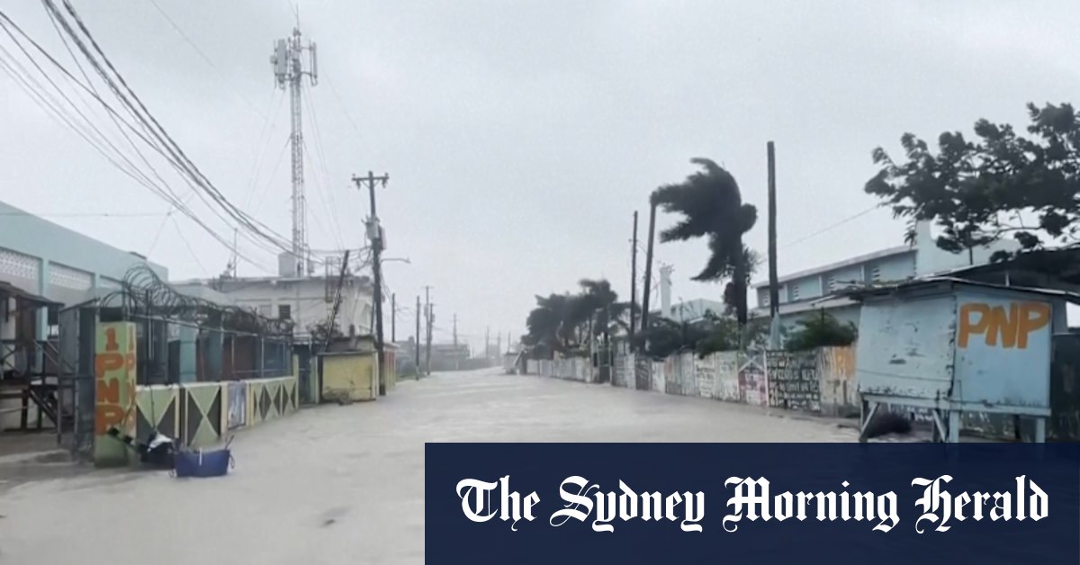 A drive through Kingston’s flooded streets