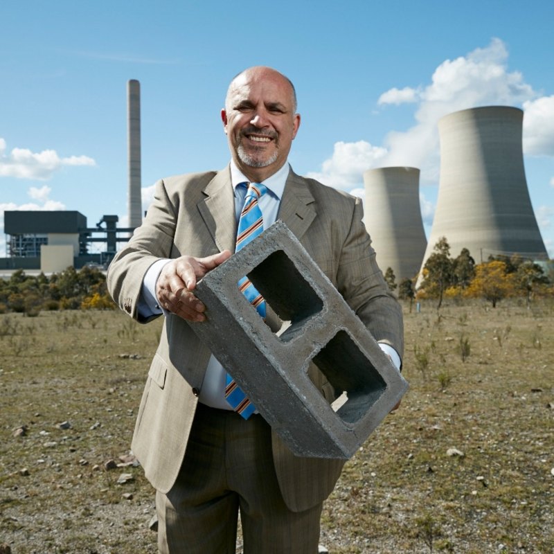 Maroun Rahme at Mount Piper power station with a non-cement building block made by Nu-Rock.