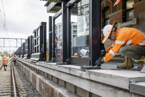 Platform screen doors are installed on platforms at stations along the converted section of the Bankstown line.