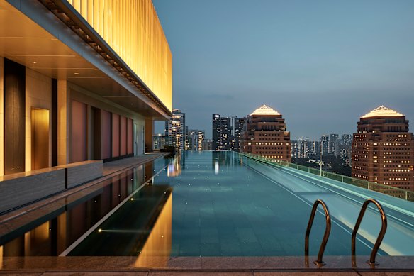 Glittering city views from the rooftop pool at COMO Singapore.
