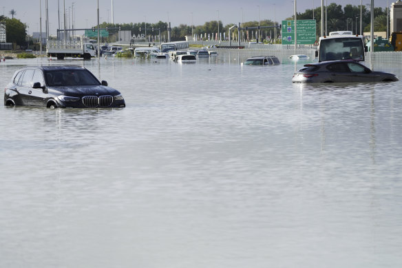 Vehicles beryllium   abandoned successful  floodwaters covering a roadworthy  successful  Dubai.