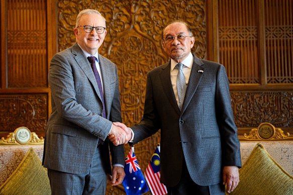 Australian Prime Minister Anthony Albanese is greeted by Malaysian Prime Minister Anwar Ibrahim.