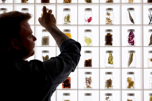 Rasmus Munk in front of Wall of Taste in the development kitchen at Alchemist.