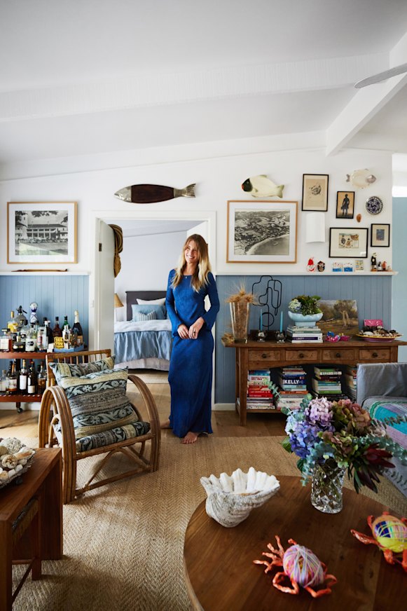 “We moved here from the inner city on a whim during the lockdowns and rented for two years before we bought this home,” says Weir. The wall panels in the lounge are painted in Porter’s Paints “Explorer Blue”.