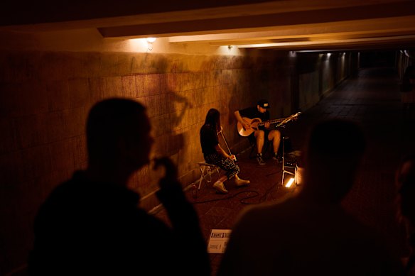 Musicians play in an under pass in central Kyiv.