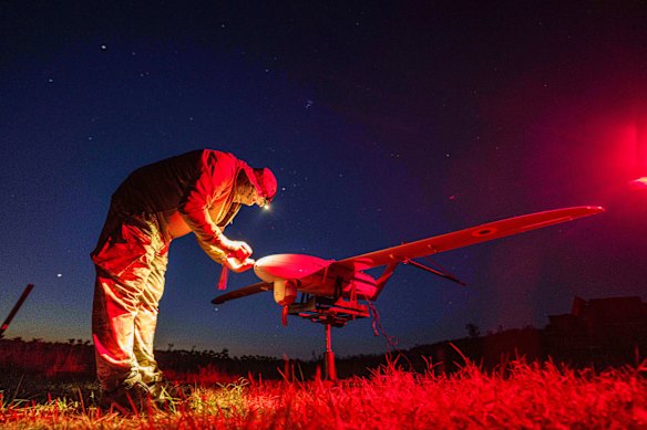 A Ukrainian National Guard serviceman of 3rd brigade, Spartan, prepares a Penguin UAV for flight near the frontline in Pokrovsk earlier this year.