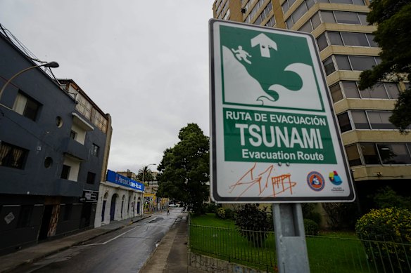 An evacuation route sign, in case of a tsunami, stands in Valparaiso, Chile.
