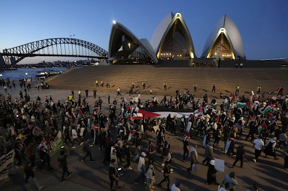 Palestinian supporters marching to the Sydney Opera House in 2023 after the October 7 attack on Israel.