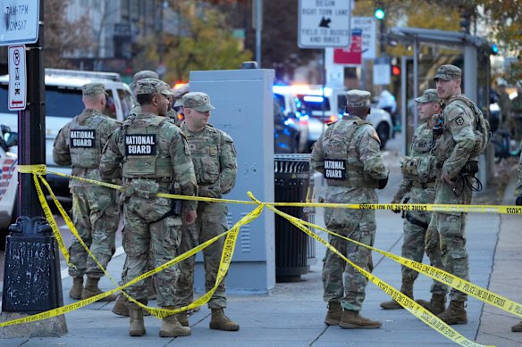 Members of the National Guard gather two of their colleagues were shot near the White House.