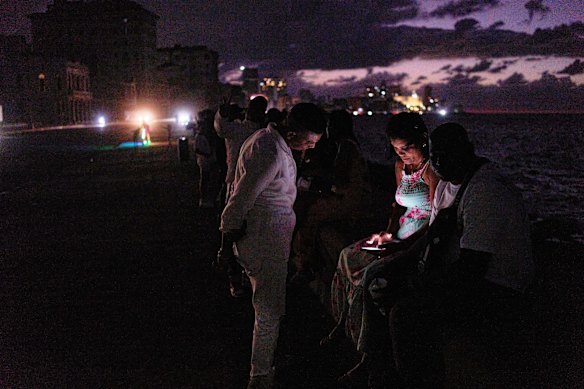 People seen during a blackout in Havana this month.