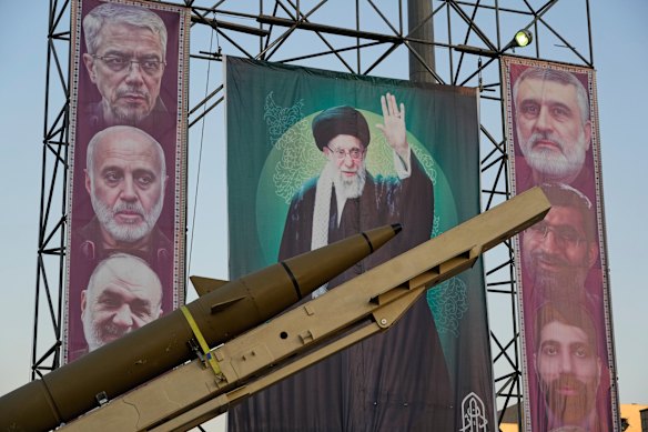 A domestically-built missile “Khaibar-buster” in an exhibition in Tehran in September, in front of portraits of Supreme Leader Ayatollah Ali Khamenei and military commanders killed in an Israeli strike in June.