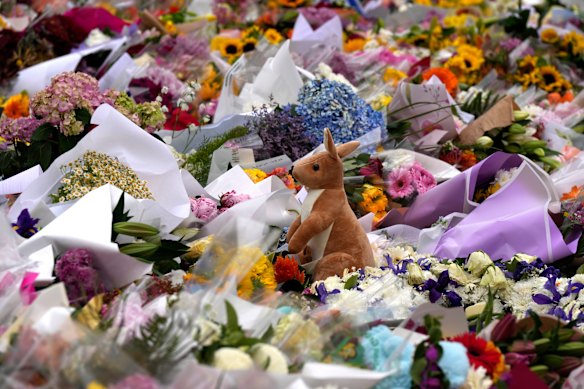 A toy kangaroo stands out among floral tributes at the Bondi Pavilion at Bondi Beach on Tuesday.