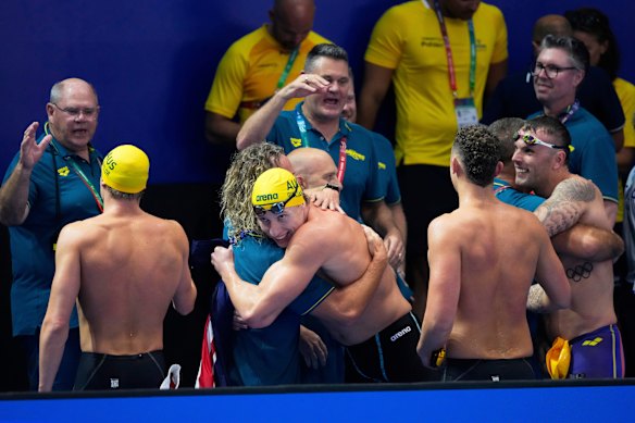 Team Australia celebrate after winning gold. 