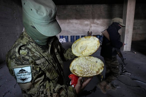 Captagon pills were hidden inside export products such as this melon, as well as pomegranates, machine parts and even doors.