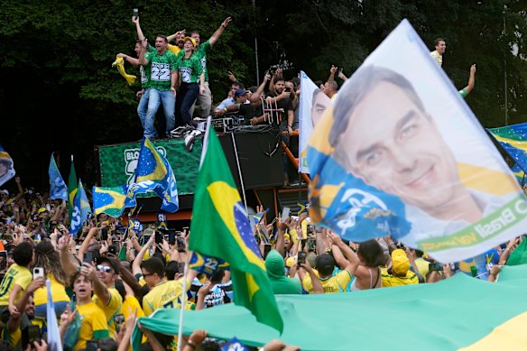 Bolsonaro supporters hold a campaign rally one week ahead of the presidential election runoff.