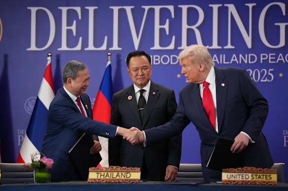 US President Donald Trump (right) with Cambodian leader Hun Manet (shaking hands) and Thai Prime Minister Anutin Charnvirakul in Kuala Lumpur, Malaysia.