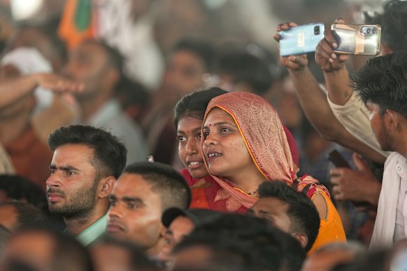 BJP supporters listen to Modi speak at the inauguration of the 594-kilometre Ganga Expressway in Uttar Pradesh.