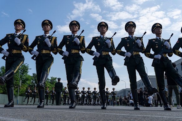 An honour guard contingent conduct drills last month to prepare for the military parade.