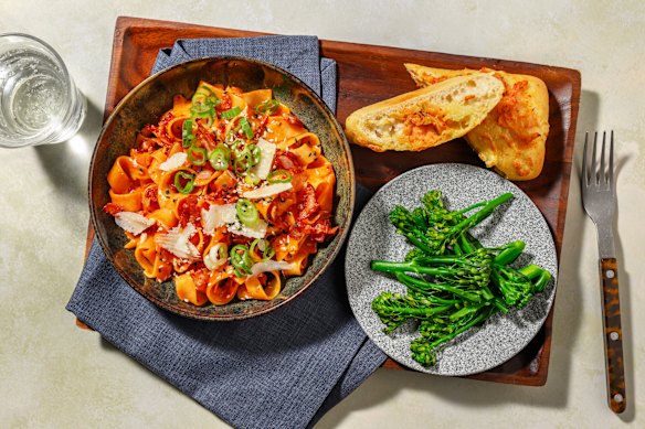 Rees’ gochujang carbonara with cheesy kimchi garlic bread and baby broccoli.