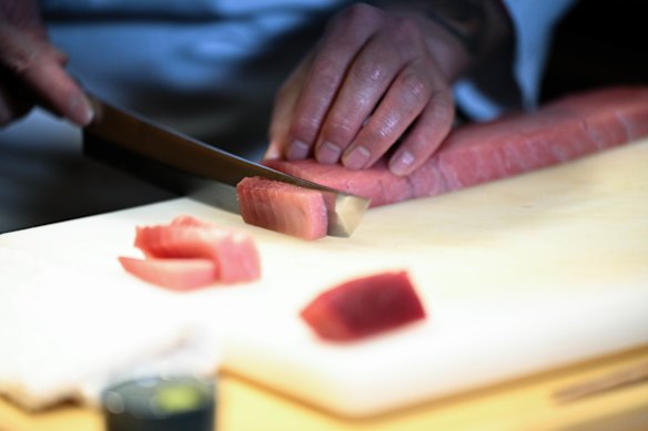 For sashimi, cut the fish on a slight angle.