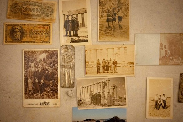 Family photos are stuck to the concrete walls at Homer, Cronulla.