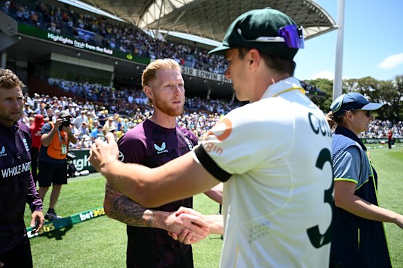 Rival Ashes captains Ben Stokes and Pat Cummins shake hands at the end of the Adelaide Test.