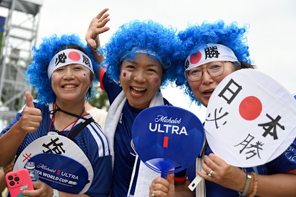 Fans cheer ahead of the World Cup match between Japan and Sweden in Arlington, Texas.