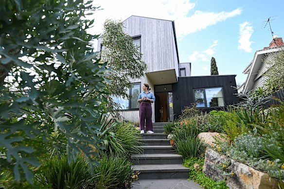 Caroline Millswood in her new home that stays at a comfortable temperature.