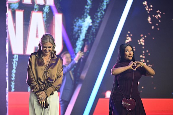 Erika Kirk (left) reassured Nicki Minaj after the gaffe during Turning Point USA’s AmericaFest 2025.