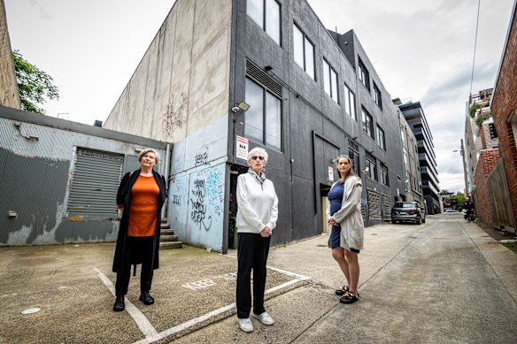 Europa on Alma chair Vanessa Lucas (left) and neighbours Barbara Kessell and Georgina Buskens in the laneway to be affected by the development.