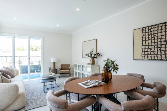 The living zone now flows to a sunlit deck, terrace and swimming pool.