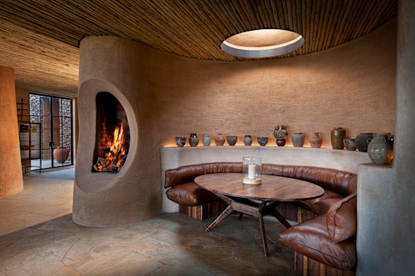 Wooden furniture, leather sofas and local ceramics lend an organic feel.