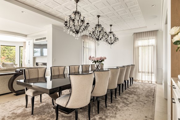 Interiors feature coffered ceilings, chandeliers, marble and natural stone bathrooms.