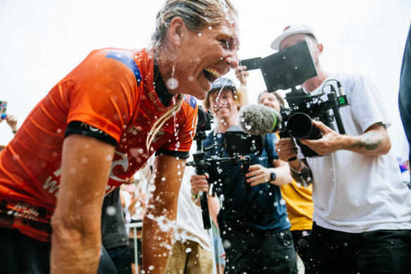 Stephanie Gilmore celebrates her record eighth world title in 2022.