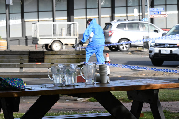 Wooden picnic tables outside the Royal Daylesford Hotel in November 2023. A BMW careered down a hill and into diners, killing five.