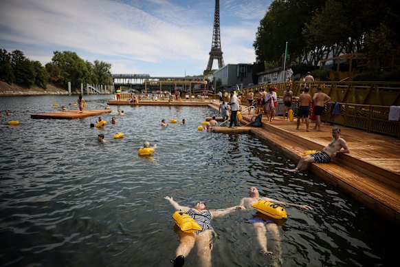 People swim at the Grenelle bathing site in the Seine on Saturday.