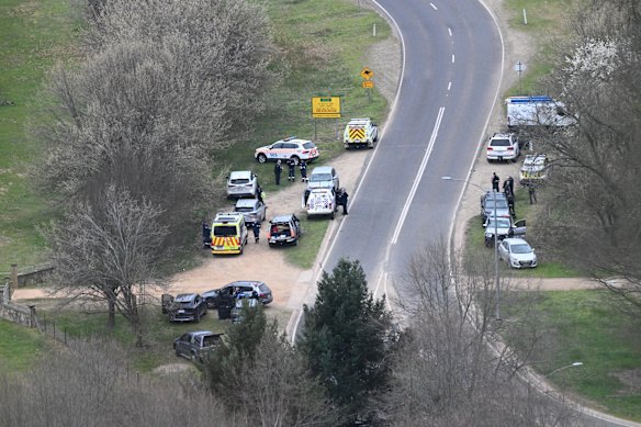 Victoria Police and emergency services at a rural property in Porepunkah.