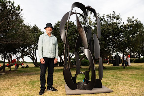 Artist James Rogers with his winning work, Siren’s Song.
