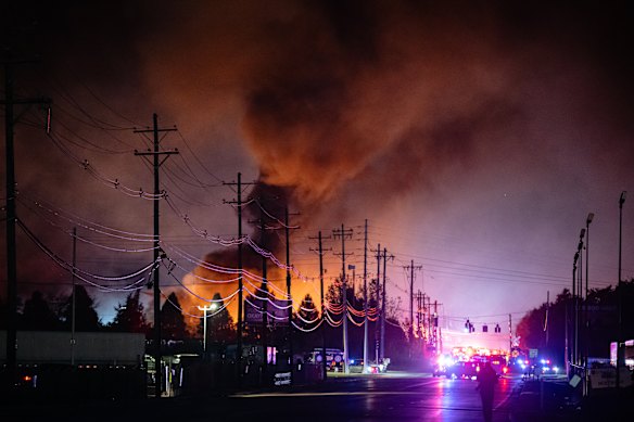 Smoke plumes rising from the aircraft crash site in Louisville, Kentucky.