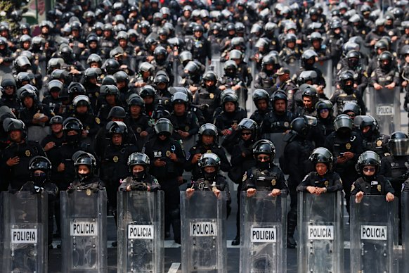 Large numbers of Mexican police have been present at World Cup matches.